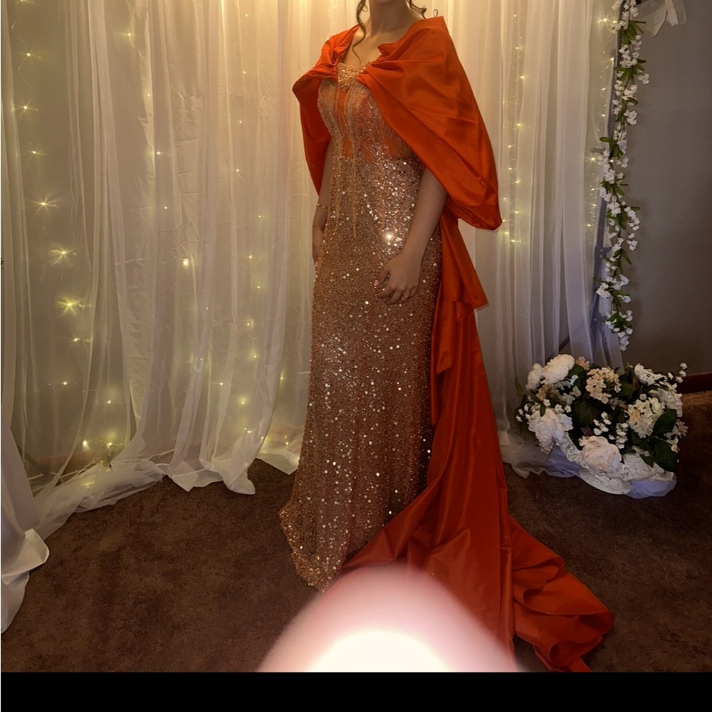 Selling these two couture dresses.
